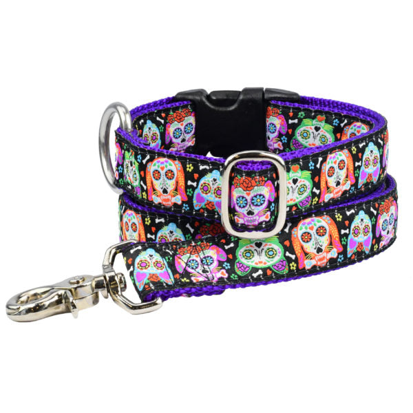 Matching 2 Hounds Design dog leash and collar with colorful sugar skulls on black background – Dia de los Muertos theme with purple lining