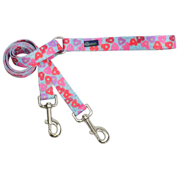 Vibrant turquoise blue double connection dog leash featuring a playful heart-shaped donut pattern and silver metal hardware by 2 Hounds Design. - Earthstyle