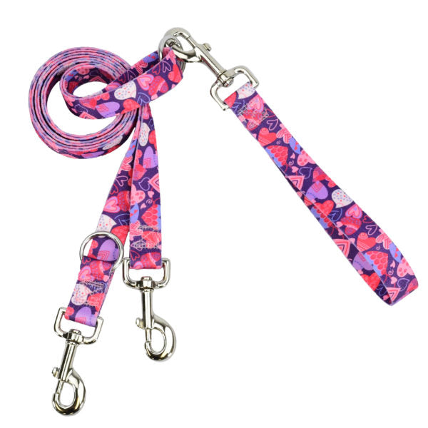 Purple and pink euro-style double connection dog leash featuring a heart pattern on durable webbing with silver metal hardware by 2 Hounds Design. - Earthstyle