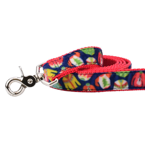 Close-up of festive multicolor sweater pattern velvet dog leash with silver hardware by 2 Hounds Design