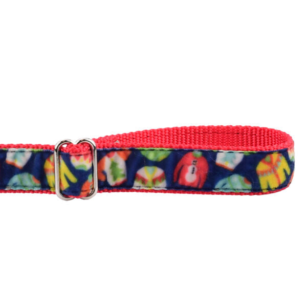 Close-up of festive multicolor sweater pattern velvet dog leash handle with adjustable feature by 2 Hounds Design