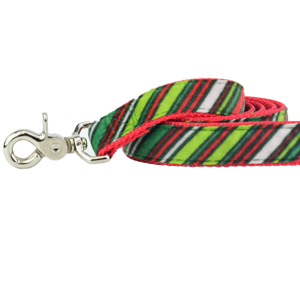 Close-up of red, green, and white striped velvet dog leash with silver hardware by 2 Hounds Design