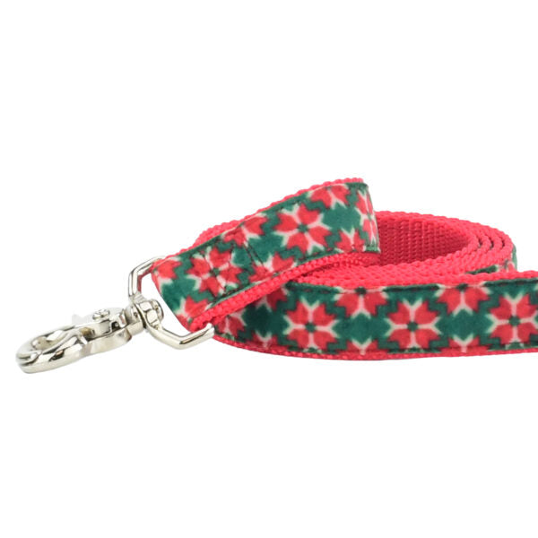 Close-up of poinsettia velvet dog leash with silver hardware by 2 Hounds Design