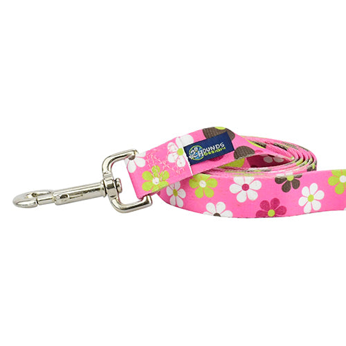 Close-up of dog leash with silver hardware featuring floral design with white flowers, geometric patterns on pink by 2 Hounds Design - Earthstyle