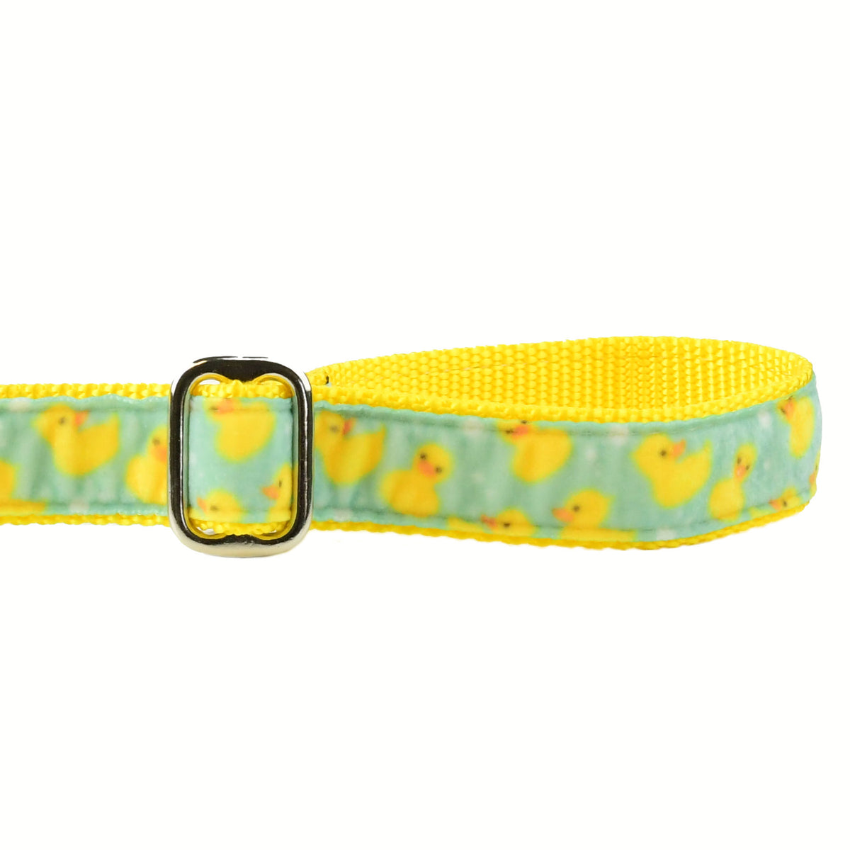 Close-up of a rubber duck print dog leash handle with adjustable handle by 2 Hounds Design 