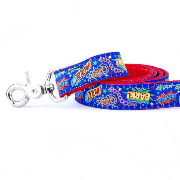 Close-up of comic book style dog leash with red webbing and blue ribbon featuring 'Bark!' and 'Zoom!' text by 2 Hounds Design